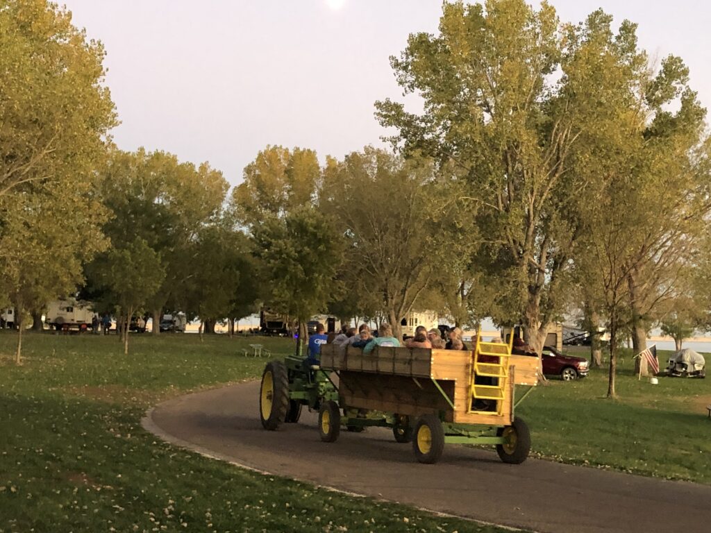 Wagon ride going through a park