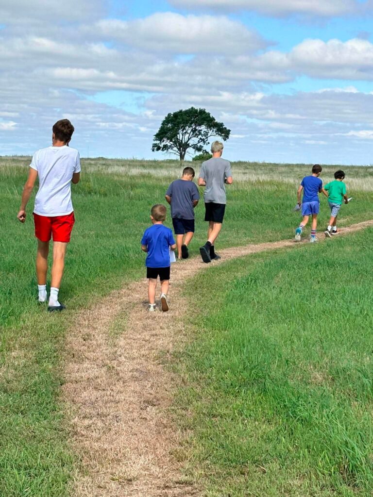 Kids walking on a trail